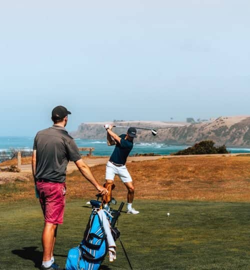 Golf pair on the tee