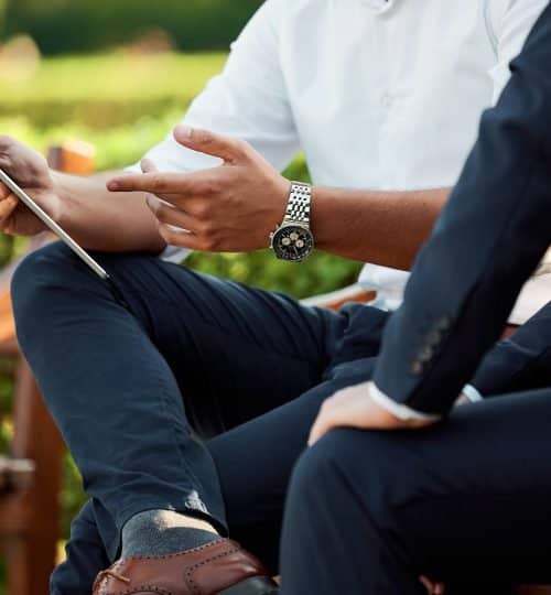 a one to one coaching session on a bench